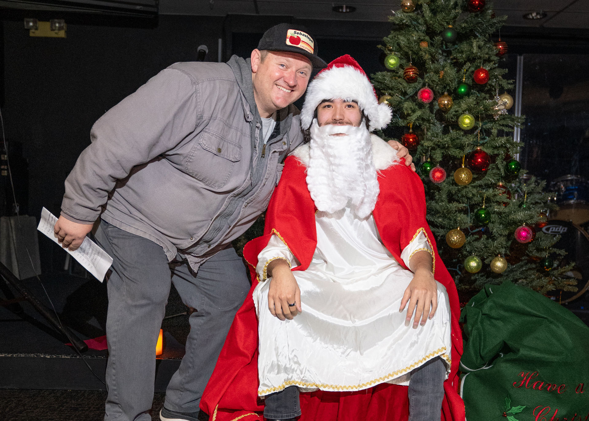German school president posting for photo with Nikolaus.